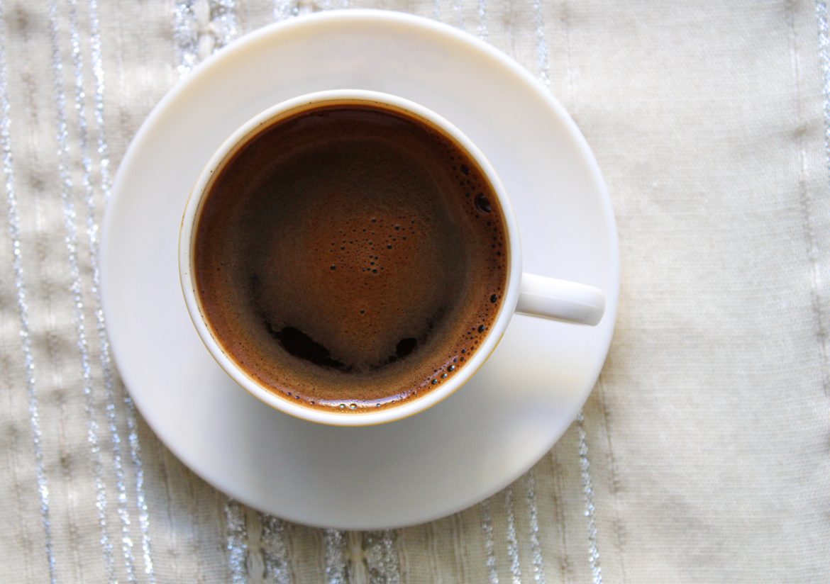 cup of dark coffee on the table