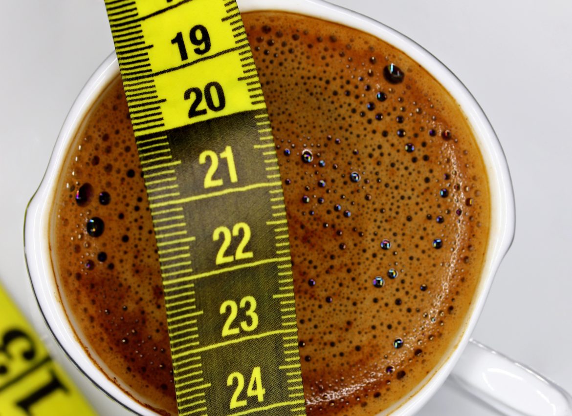 cup of Turkish coffee with measuring tape